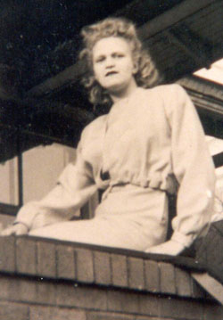 Rosie sitting on porch ledge in 1946 photo