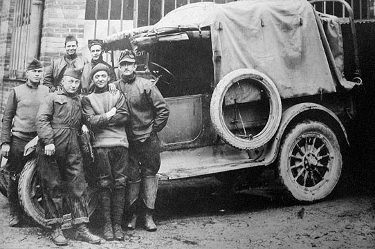 Soldiers by a jeep