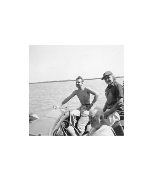 Joe and Sadie Schulte in a boat on Lake Pontiac