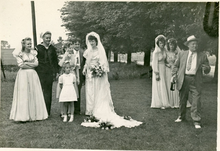 RosieSchulte, Wally Jeske, Hooke with his wife and daughter, MaryLou Ruhlman,
        Celia Ruhlman and Margaret Ruhlman in front of their house, JoeSchulte.jpg